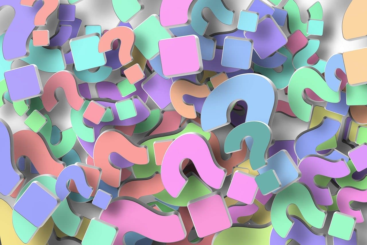 illustration of multi-color question marks in a pile